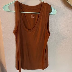 White and orange tank tops